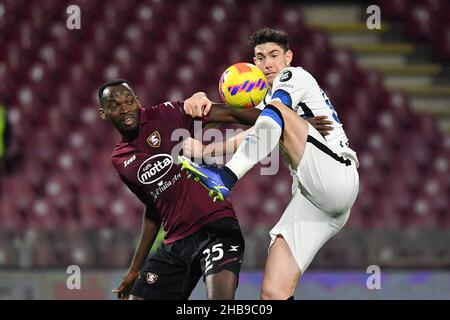 Salerno, Italy. 17th Dec, 2021. Salernitana's forward Simy compete for the ball with Inter Milan's defender Alessandro Bastoni during US Salernitana vs Inter - FC Internazionale, italian soccer Serie A match in Salerno, Italy, December 17 2021 Credit: Independent Photo Agency/Alamy Live News Stock Photo