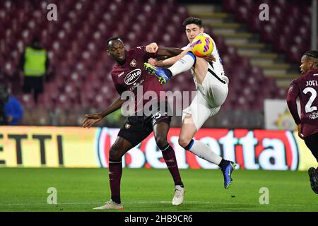 Salerno, Italy. 17th Dec, 2021. Salernitana's forward Simy compete for the ball with Inter Milan's defender Alessandro Bastoni during US Salernitana vs Inter - FC Internazionale, italian soccer Serie A match in Salerno, Italy, December 17 2021 Credit: Independent Photo Agency/Alamy Live News Stock Photo