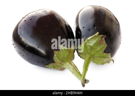 Two fresh heirloom eggplants isolated closeup Stock Photo