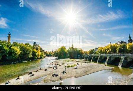 Blue sky and sun on the Isar river in Munich Stock Photo