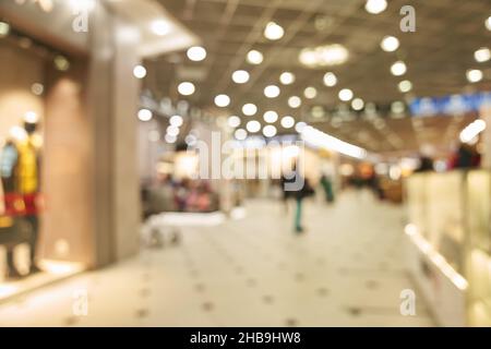 Blurry soft and out of focus people in the hypermarket. High quality photo Stock Photo