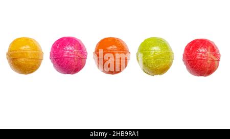 Lollipops on an isolated white background. Mix of multi-colored candy balls. Stock Photo