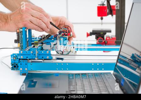 Precision instrument for photo-optical research in a laboratory. Stock Photo