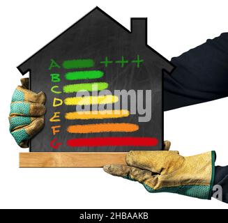 Hands with protective work gloves showing a blackboard in the shape of a house with a chalk drawing of an energy efficiency rating. Isolated on white Stock Photo