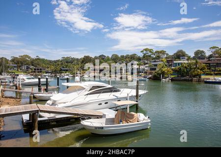 Waterfront homes in Newport Sydney, with private jetties and homeowners with their boats moored, Pittwater,NSW,Australia Stock Photo