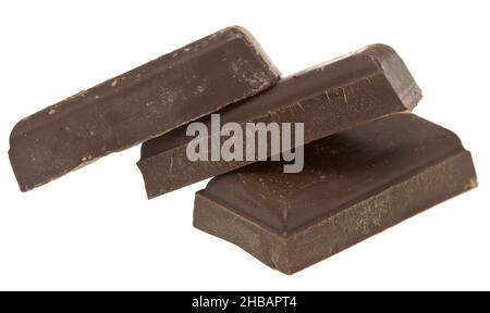 Stack of chocolate pieces isolated on white background Stock Photo