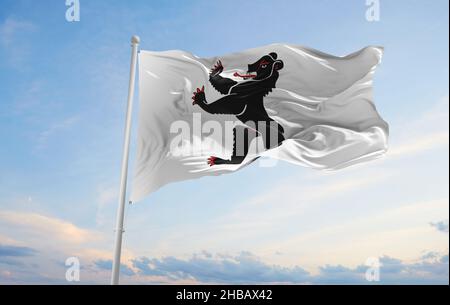 flag of Canton of Appenzell Innerrhoden , Switzerland at cloudy sky background on sunset, panoramic view. Swiss travel and patriot concept. copy space Stock Photo