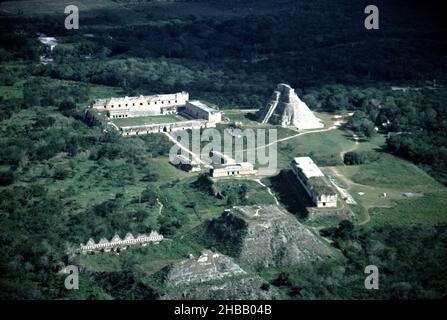 Uxmal Yucatan Mexico. 12/27/1985. Aerial of Uxmal ruins.  Occupation estimated population about 15,000 people at Uxmal’s peak.  Uxmal: capital of a Late Classic Maya circa 850-925 AD. Most building ceased by 1100 AD.  Maya chronicles suggest Uxmal was founded about 500 A.D. by and ruled-by the Hun Uitzil Chac Tutul Xiu family. Stock Photo