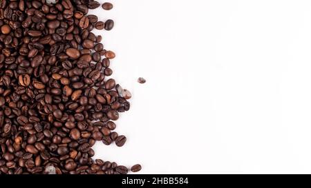 Coffee beans borders made from roasted coffee beans. Top view, close up, place for text. Blank for text. Stock Photo