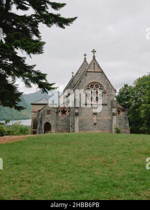 St Mary and St Finnan Catholic Church stands at the northern end of Loch Shiel near Glenfinnan in the western highlands of Scotland Stock Photo