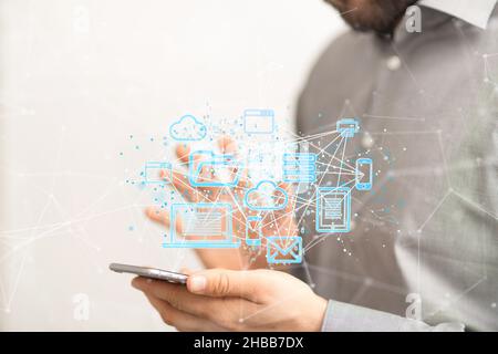 Illustration of the Internet infrastructure over the phone of a businessman Stock Photo