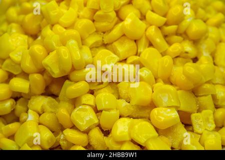 Boiled corn, closeup photo of boiled yellow corn kernels. Full frame food background. Stock Photo