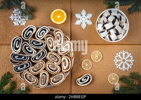 Decorative arrangement with croissants and slices of cake on cake shortcrust for the winter holidays Stock Photo