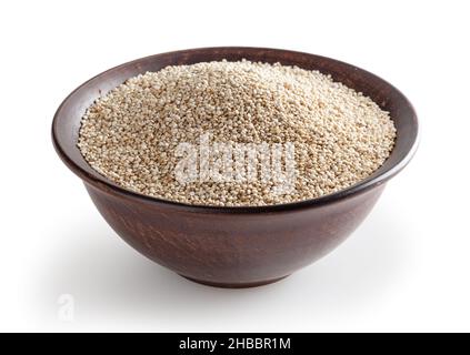 Dried white quinoa seeds in ceramic bowl isolated on white background with clipping path Stock Photo