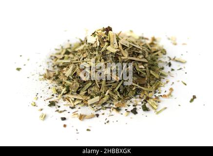 Dried chopped herb on white isolated background Stock Photo