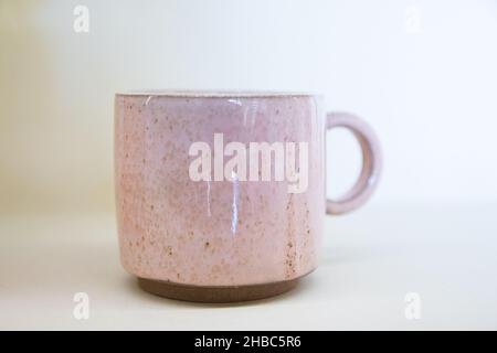 Pink mug isolated on white background Stock Photo