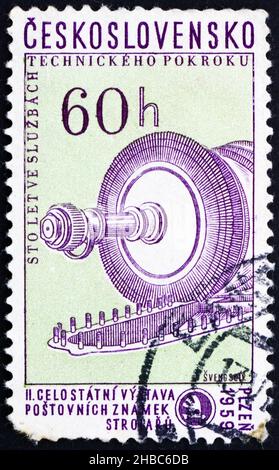 CZECHOSLOVAKIA - CIRCA 1959: a stamp printed in the Czechoslovakia shows Part of Steam Condenser Turbine, Centenary of the Skoda Armament Works, circa Stock Photo
