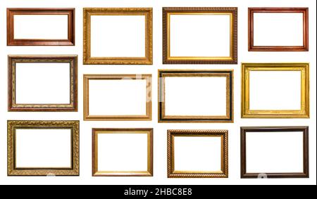 set of various vintage wooden picture frames with blank canvas cutout on white background Stock Photo
