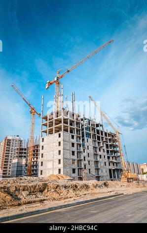 New residential development and high-rise crane Stock Photo