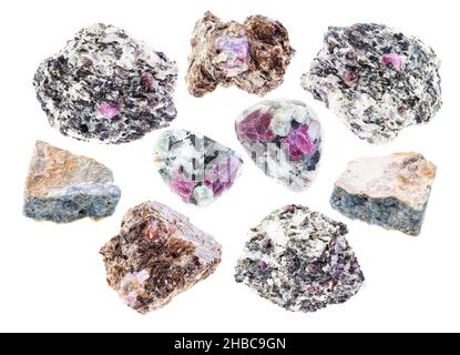 set of various Corundum crystals in rocks cutout on white background Stock Photo