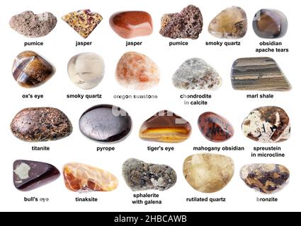 set of various tumbled brown stones with names cutout on white background Stock Photo