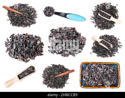 set of various dried black Berberis fruits cutout on white background Stock Photo