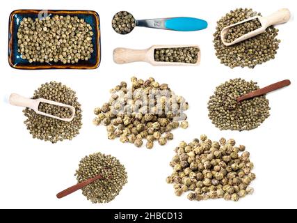 set of various green pepper peppercorns (unripe piper nigrum fruits) cutout on white background Stock Photo