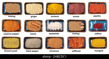 set of various ground spices in bowls with names cutout on white backgrownd Stock Photo