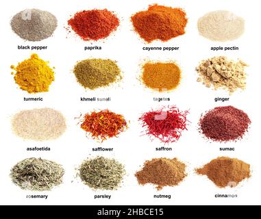 set of piles on powdered spices with names cutout on white background Stock Photo