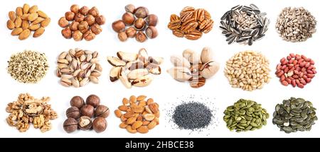 set of various piles of nuts cutout on white background Stock Photo