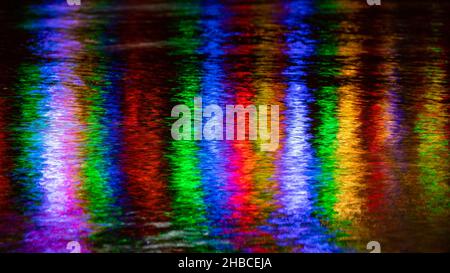 Abstract colored light reflections in water - Golden, Colorado, USA Stock Photo