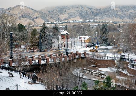 A winter wonderland landscape - Washington Avenue Bridge over Clear Creek in Golden, Colorado, USA Stock Photo