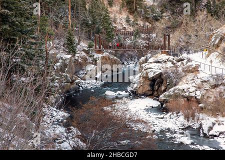 Suspension bridge on Welch Ditch Trail in Clear Creek Canyon. Part of the Peaks to Plains Trail - near Golden, Colorado, USA Stock Photo