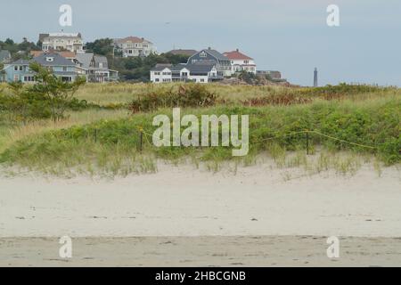 White sands of Good Harbor Beach adorn the North of Boston. Busy in summer, get here early for a parking space. Houses overlook the beach, Stock Photo