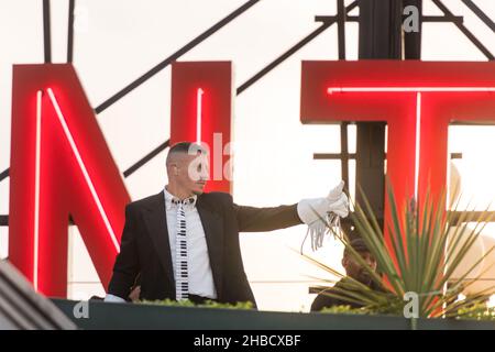 Seattle, USA. 17th Nov, 2021. Macklemore and Windser on the roof at Pike Place Market shooting a video. Stock Photo