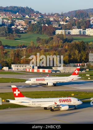 Swiss Air Lines two Airbus A220 aircraft at Zurich Airport. Bombardier CS300 airplanes of Swiss Airlines at Kloten Airport, Switzerland. Stock Photo