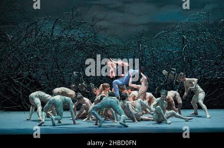 Hamburg, Germany. 17th Dec, 2021. Dancers Alexandr Trusch (above) as Prince Desire and ensemble stand during a photo rehearsal of the ballet 'Sleeping Beauty' on stage at the Hamburg State Opera. The new version of the ballet 'Sleeping Beauty' by John Neumeier to the music of Peter Tchaikovsky will celebrate its premiere on 19.12.2021. Credit: Georg Wendt/dpa/Alamy Live News Stock Photo