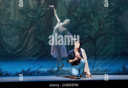 Hamburg, Germany. 17th Dec, 2021. Dancers Helene Bouchet as the Fairy Godmother (The Rose) and Alexandr Trusch as Prince Desire stand on the stage of the Hamburg State Opera during a photo rehearsal of the ballet 'Sleeping Beauty'. The new version of the ballet 'Sleeping Beauty' by John Neumeier to music by Peter Tchaikovsky will premiere on Dec. 19, 2021. Credit: Georg Wendt/dpa/Alamy Live News Stock Photo