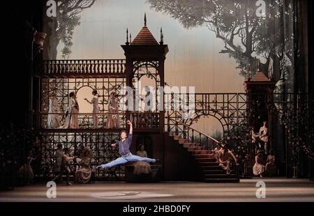 Hamburg, Germany. 17th Dec, 2021. Dancer Alexandr Trusch (front) as Prince Desire and members of the ensemble stand on the stage of the Hamburg State Opera during a photo rehearsal of the ballet 'Sleeping Beauty'. The new version of the ballet 'Sleeping Beauty' by John Neumeier to music by Peter Tchaikovsky will celebrate its premiere on 19.12.2021. Credit: Georg Wendt/dpa/Alamy Live News Stock Photo