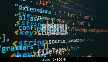 Monitor closeup of function source code. Abstract IT technology background. Software source code. Stock Photo
