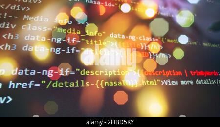 Programming code screen of software developer. Software Programming Work Time. Code text written and created Stock Photo