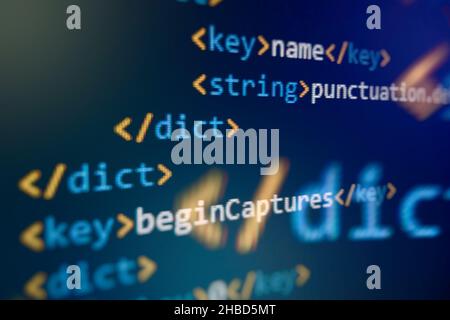 SEO optimization. Modern tech. PHP syntax highlighted. Writing programming functions on laptop. Big data and Internet of things trend. Stock Photo