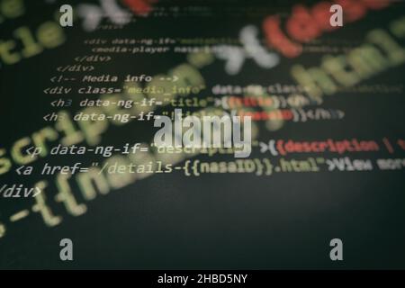 Programming code screen of software developer. Software Programming Work Time. Code text written and created Stock Photo