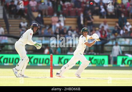 Test Pictrue Australia's Marnus Labuschagne, right, plays a shot as South Africa's ...