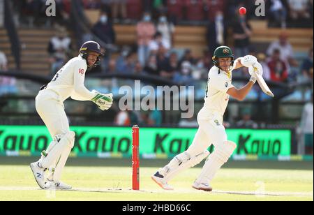 Test Pictrue Australia's Marnus Labuschagne, right, plays a shot as South Africa's ...