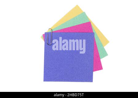 A sticker and a paper clip isolated on a white background. Copy space. Stock Photo