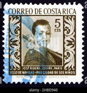 COSTA RICA - CIRCA 1959: a stamp printed in Costa Rica shows Boy, Painting by Jose Ribera, circa 1959 Stock Photo