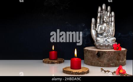 Buddha statue on black background. Stock Photo