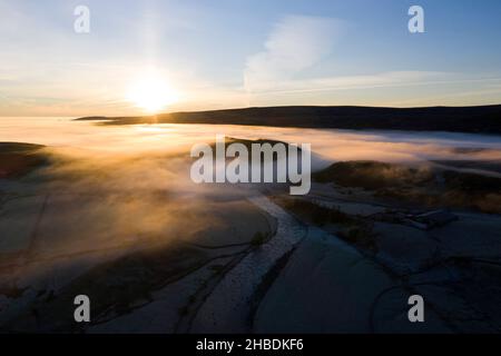Teesdale, County Durham, UK. 19th December 2021. UK Weather.  There were some spectacular views of fog filled valleys while the sun shines above the cloud in Upper Teesdale today. Credit: David Forster/Alamy Live News Stock Photo