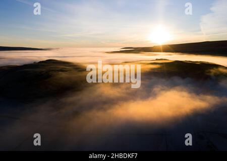 Teesdale, County Durham, UK. 19th December 2021. UK Weather.  There were some spectacular views of fog filled valleys while the sun shines above the cloud in Upper Teesdale today. Credit: David Forster/Alamy Live News Stock Photo